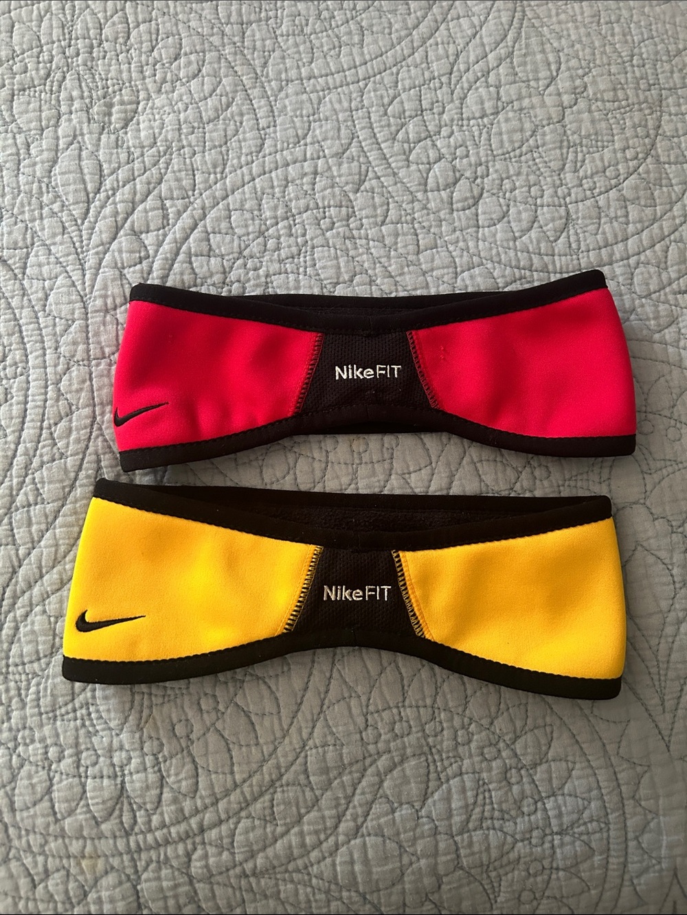 Nike Women’s Reversible Headbands in Red and Yellow